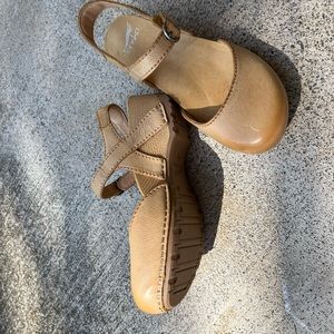 Brand new, never worn Tiffany wedge danskos. Size 36. Perfect condition.